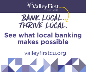 Valley First Credit Union banner: 'Bank Local. Thrive Local.' with a yellow arrow, then 'See what local banking makes possible' and 'valleyfirstcu.org' over a blue-purple geometric pattern.
